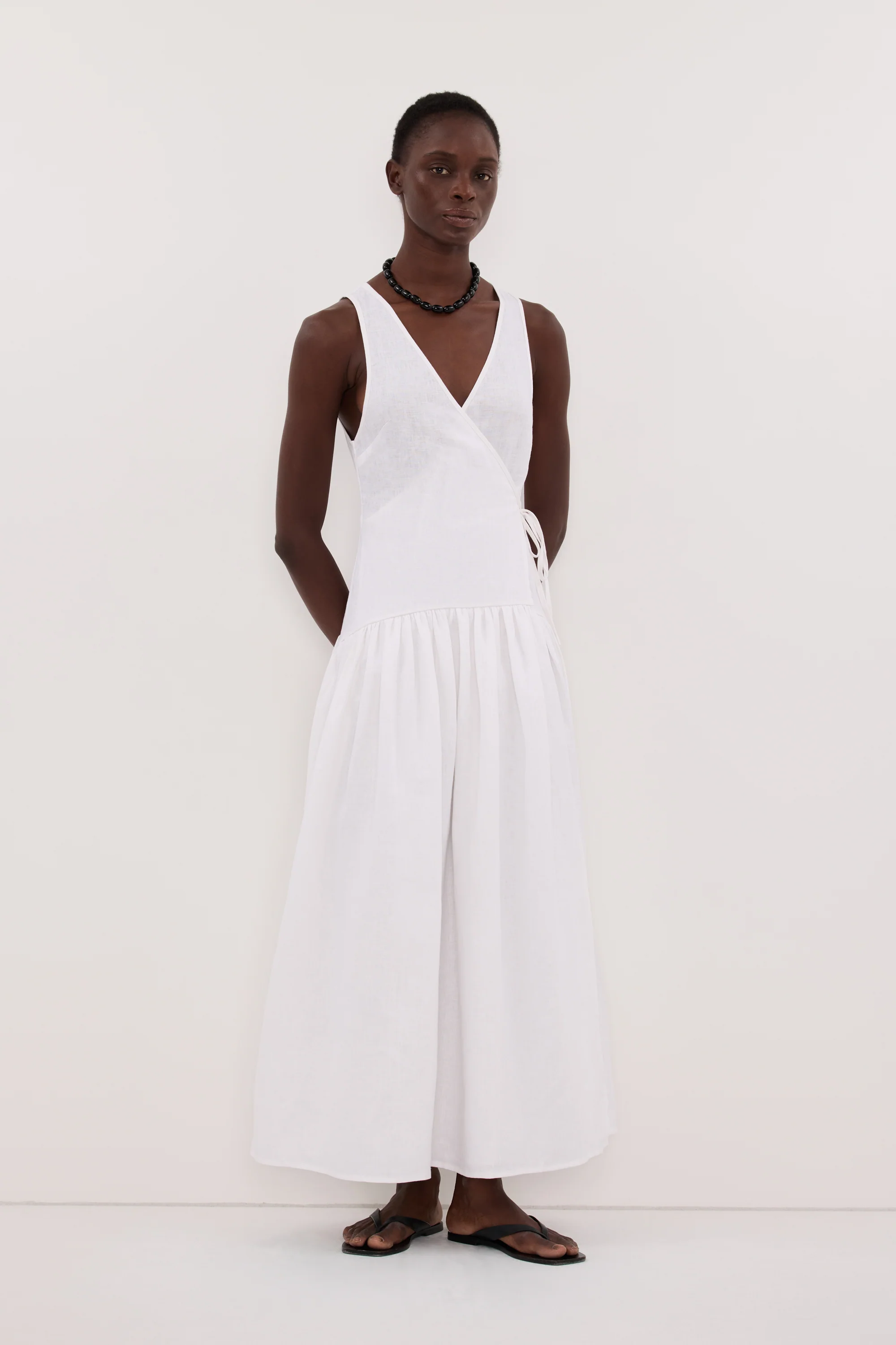 ILIO WHITE SLEEVELESS LINEN WRAP MIDI DRESS